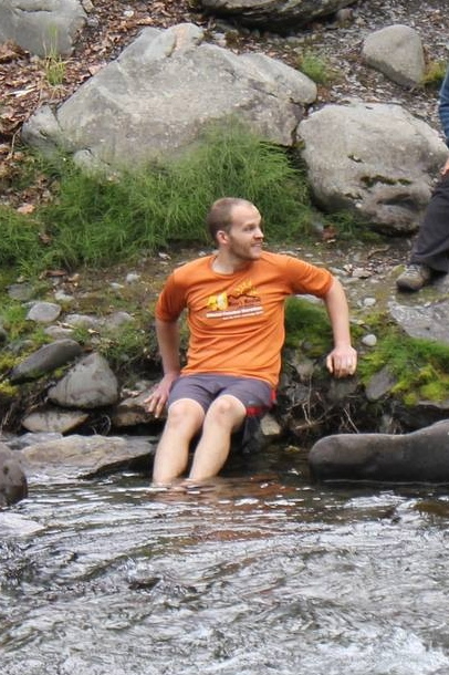 Soaking my feet in the icy cold river after the race.